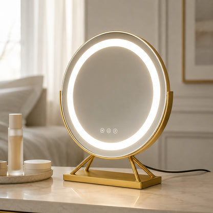 Gold lighted vanity mirror on a refined bedroom dressing table