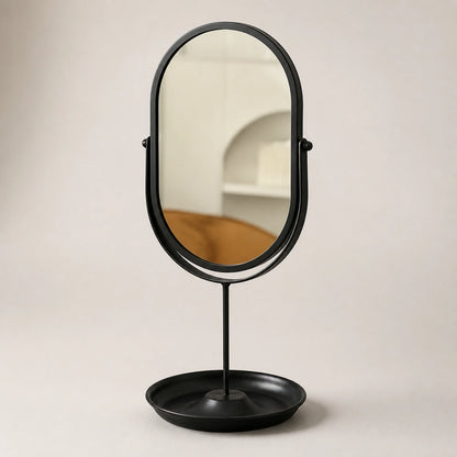 Black oval vanity mirror on a clean contrasting background