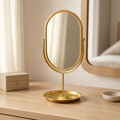 Gold oval vanity mirror in a premium modern bedroom