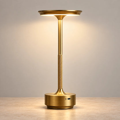 Gold rechargeable touch table lamp switched on
